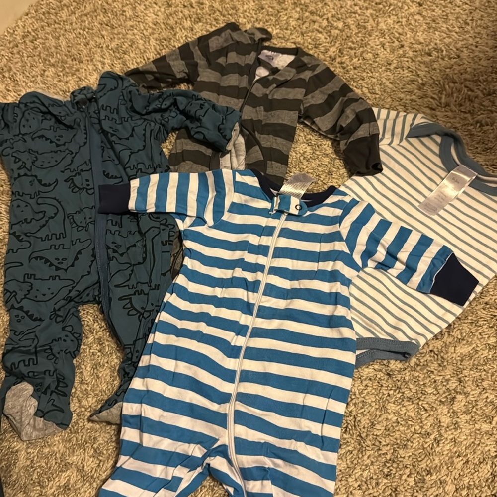 3 0-3 month baby boy onesies and 1 newborn onesie